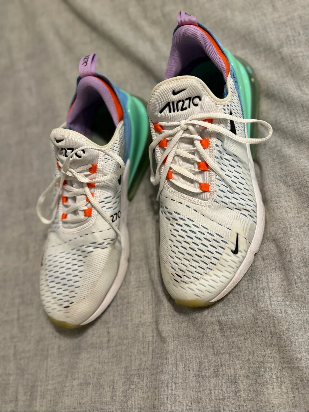 Nike White Running Sneakers with Orange Accents and Purple Lining